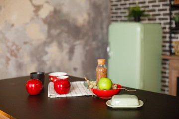 Christmas decorated kithen in loft style. Black, green and red colors. Modern loft style of interior dacorated for New Year Eve