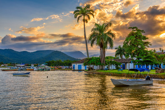 Embankment of historical center in Paraty at sunset, Rio de Janeiro, Brazil. Paraty is a preserved Portuguese colonial and Brazilian Imperial municipality