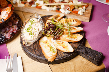 Crunchy baguette toasts with a soft pate and greens