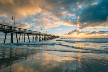 Fotobehang The pier at sunset, in Imperial Beach, near San Diego, California © jonbilous