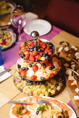 Berries and fruit centerpiece on a banquet table