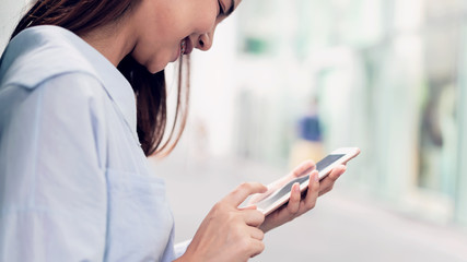 Woman using smartphone, During leisure time. The concept of using the phone is essential in everyday life.