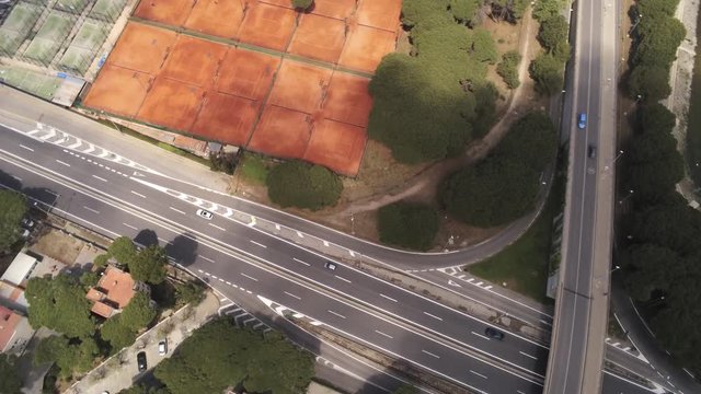 Barcelona. Aerial view from a drone on the highway and the road  in Castelldefels, coastal village in Spain. 4k Drone Video