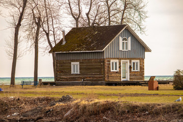 Obraz premium Cottage By The Water