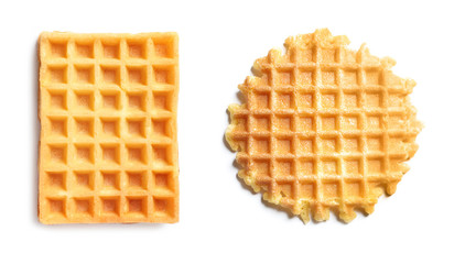 Set of delicious waffles on white background, top view