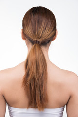 Fototapeta premium Asian Woman before applying make up hair style. no retouch, fresh face with acne, eyes, cheek, nice smooth skin. Studio lighting white background, aesthetics therapy treatment, rear side back view