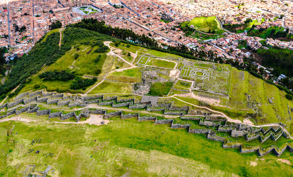 Aerial top view of the inca ruins of Sacsayhuaman on the outskirts of Cusco, Peru. Archaeological site of ancient Incan citadel.