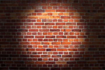 Texture of red brick wall with vignette. Background of red brick wall