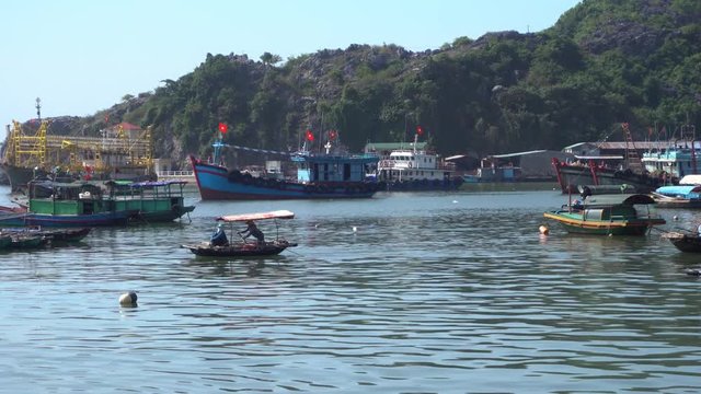 Fishing boat on the midlle of port