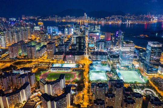 Top view of city of Hong Kong at night © leungchopan