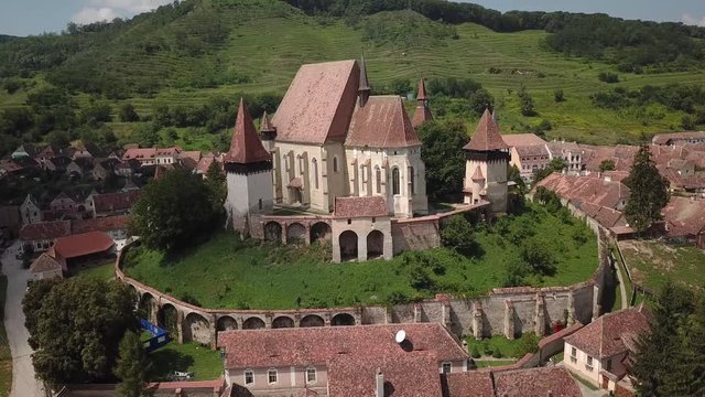 Aerial video of medieval Biertan Berethalom fortified church in Transylvania Romania