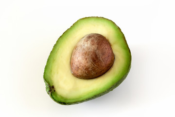 Natural organic ripe avocado. Half avocado on white background. Isolated.