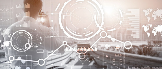 Business interface mixed media double exposure financial chart graph diagram and icon on virtual screen. Innovation concept