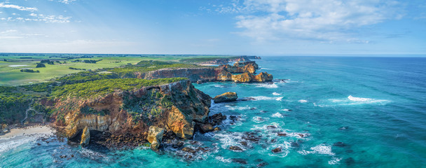 Aerial panorama of eroding rocks on ocean coastline near Warrnambool, Australia
