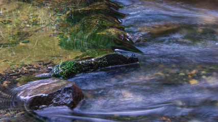 Naklejka na ściany i meble small water cascade in Velka Bela river near Jetrichovice, Czech Republic