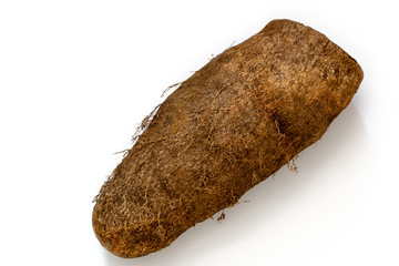 Raw organic yellow yam, a food staple in Jamaican and Caribbean meals/dishes. It is a starchy...
