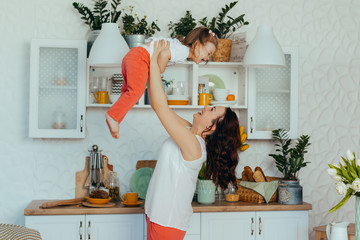 Mom and daughter in the kitchen.