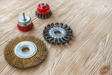 abrasive tools for brushing wood and giving it texture. Wire brushes on treated wood