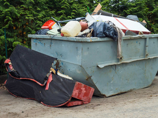 Loaded dumpster filled with rubble dumpster, recycle, waste and garbage