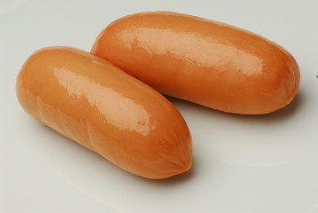 Two fresh sausage isolated on gray background