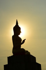 Obraz premium temple and buddha statue,Buddhist shadow with wisdom enlighten light spread.