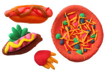 plasticine hot dog, pizza, French fries isolated on white background. modelling clay