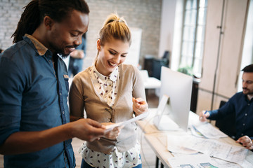 Portrait of architects having discussion in office