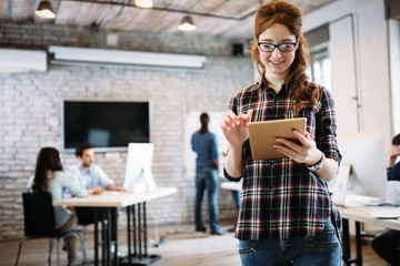 Young attractive architect working in modern office