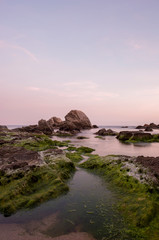 Beach and rocks at sunset in Lloret de Mar