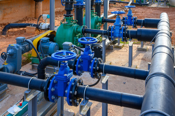 Equipment, cables and piping as found inside of a industrial power plant