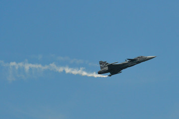 A fighter aircraft flying for display