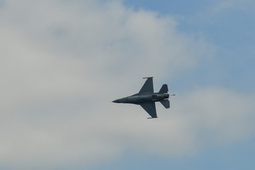 A fighter aircraft flying for display