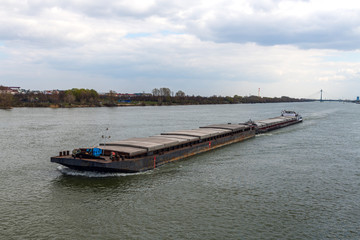 Fototapeta na wymiar Cargo ship in Danube river at Vienna, Austria.