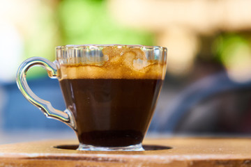 Dark espresso coffee on the table