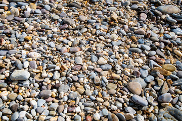 Cold stones beach textured background