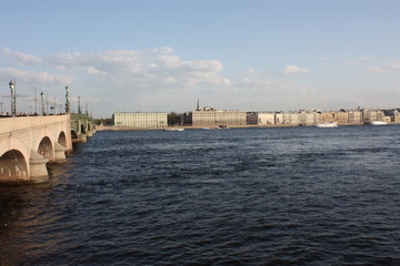 Fototapeta premium view of the river, stone bridge and buildings of St. Petersburg 
