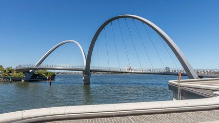 Fototapeta na wymiar The futuristic forms of Elizabeth Quay's pedestrian bridge in Perth, Western Australia
