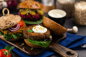Vege burgers with carrots, beetroots and mushrooms.