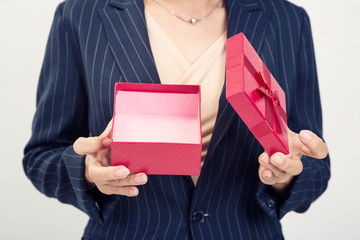 Red gift box from business woman