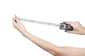 Measuring yardstick is female hands