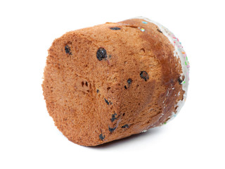 Easter cake with raisins and white cap made of icing and colored powder isolated