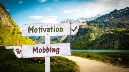 Street Sign to Motivation versus Mobbing