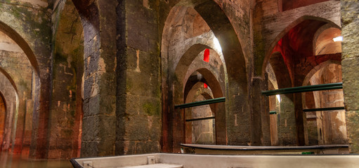 Rowboat at the underground Pool of Arches in Ramla. Israel. Pool built during the reign of the...