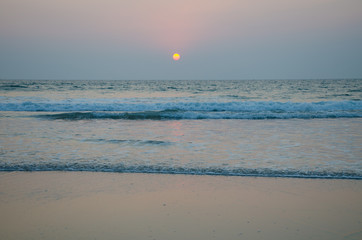 Sunset over a sea smooth surface a beautiful landscape