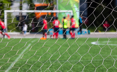 football net behind the football goal