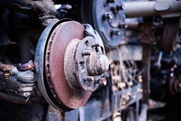 Parts of used cars sitting in junkyard