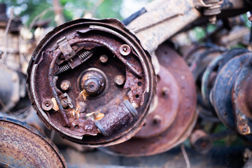 Parts of used cars sitting in junkyard