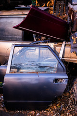 Useless, worn out rusty parts of used car
