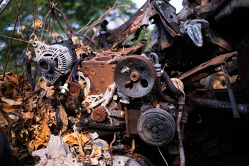 Parts of used cars sitting in junkyard