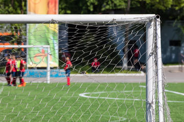 football net behind the football goal